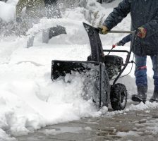 Mechanical snow removal of snow-covered pavement